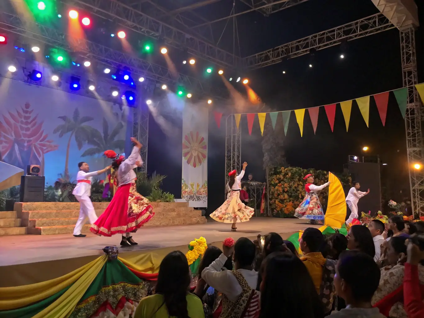 A vibrant photograph capturing a dance performance on the CGSFPP stage, showcasing the energy and cultural richness of the event.